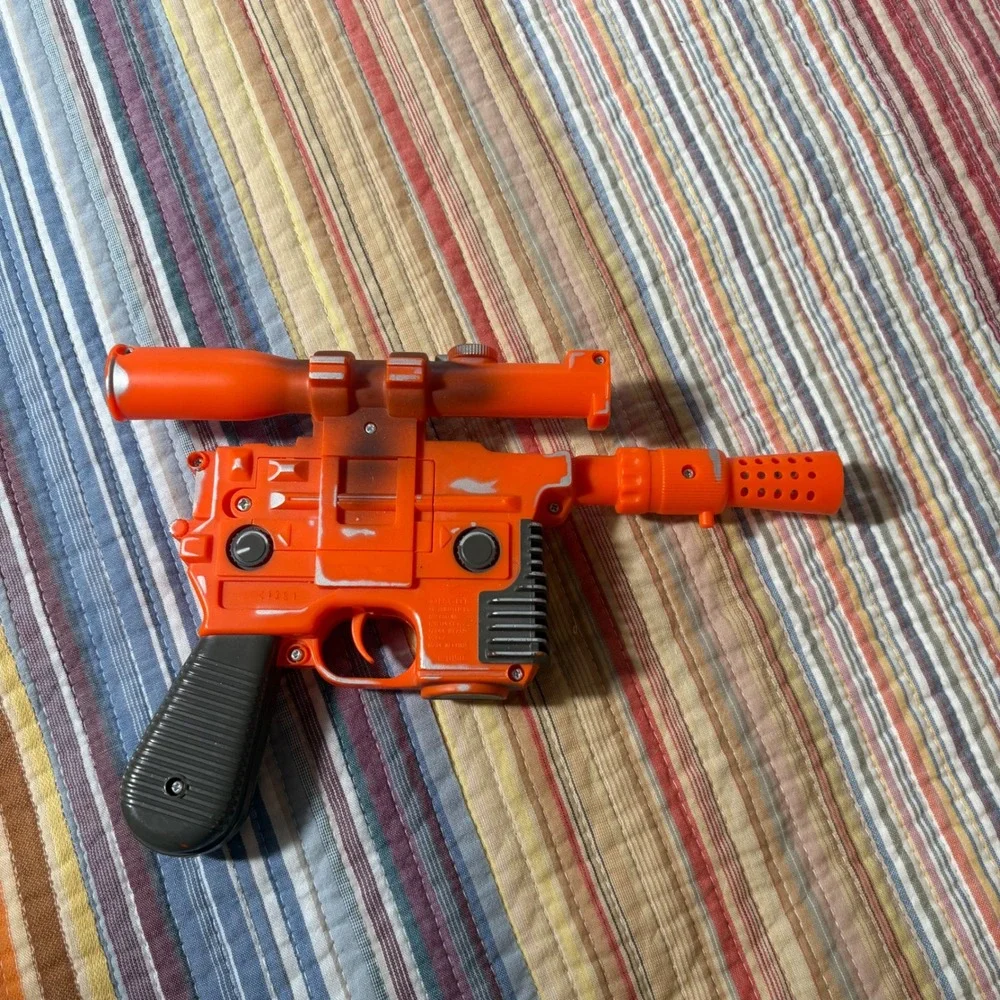 Disney Star Tours Star Wars Han Solo DL-44 Blaster Toy Orange Silver Weathered